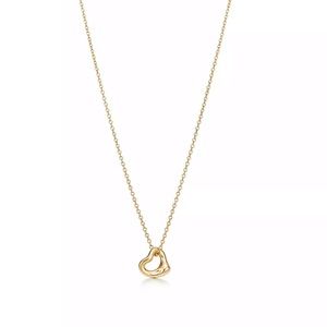 Tiffany & Co. “Open Heart Pendant” by Elsa Peretti. 18k yellow gold. Never worn.